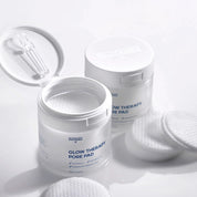 Glutanex Glow Therapy Pore Pad jar with pads and tweezers – brightening and moisturizing Korean toner pads with glutathione and triple hyaluronic acid for hydration. Formulated with AHA, BHA, and LHA to gently exfoliate dead skin and impurities, improving skin texture without irritation.
