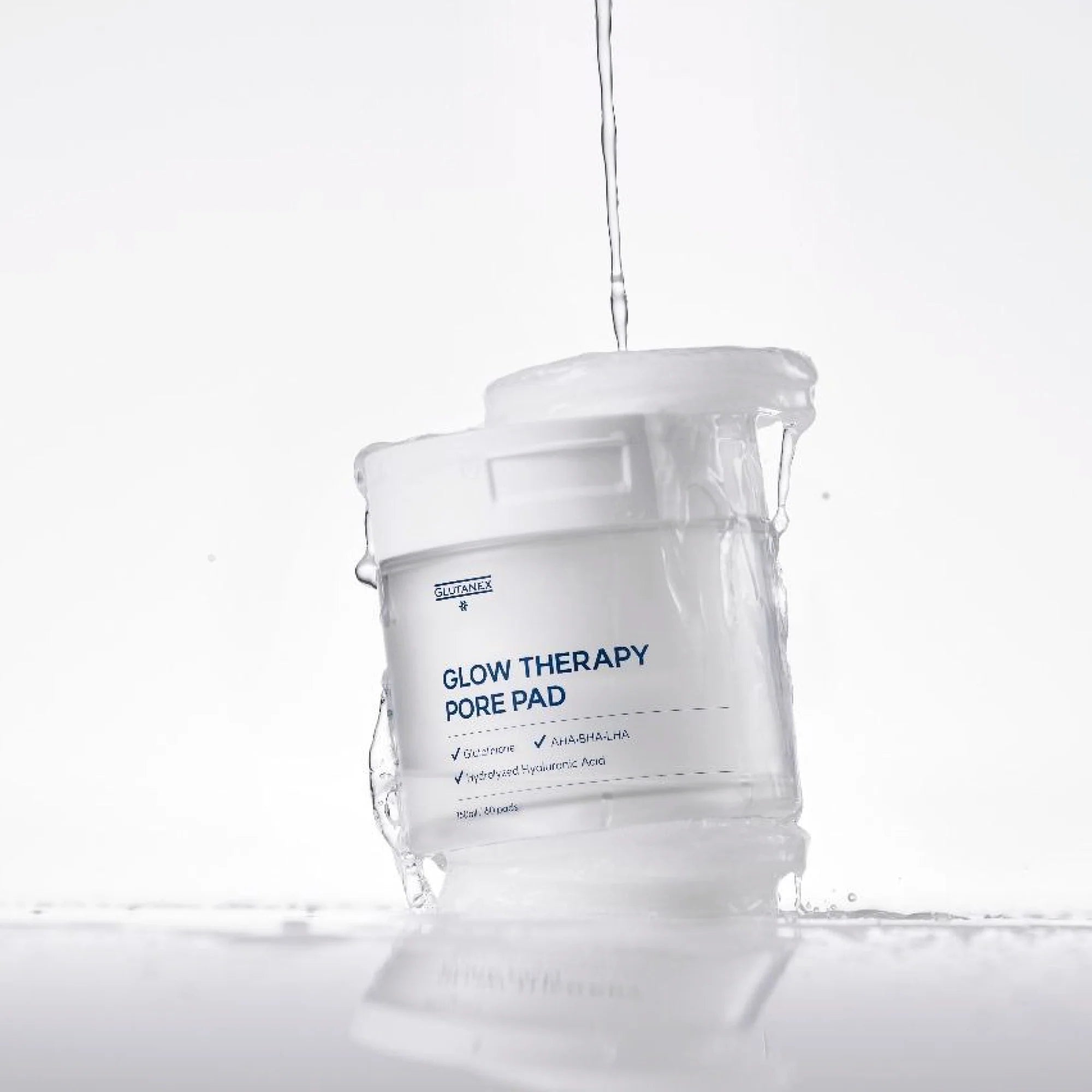 Glutanex Glow Therapy Pore Pad jar with pads and tweezers – brightening and moisturizing Korean toner pads with glutathione and triple hyaluronic acid for hydration. Formulated with AHA, BHA, and LHA to gently exfoliate dead skin and impurities, improving skin texture without irritation.