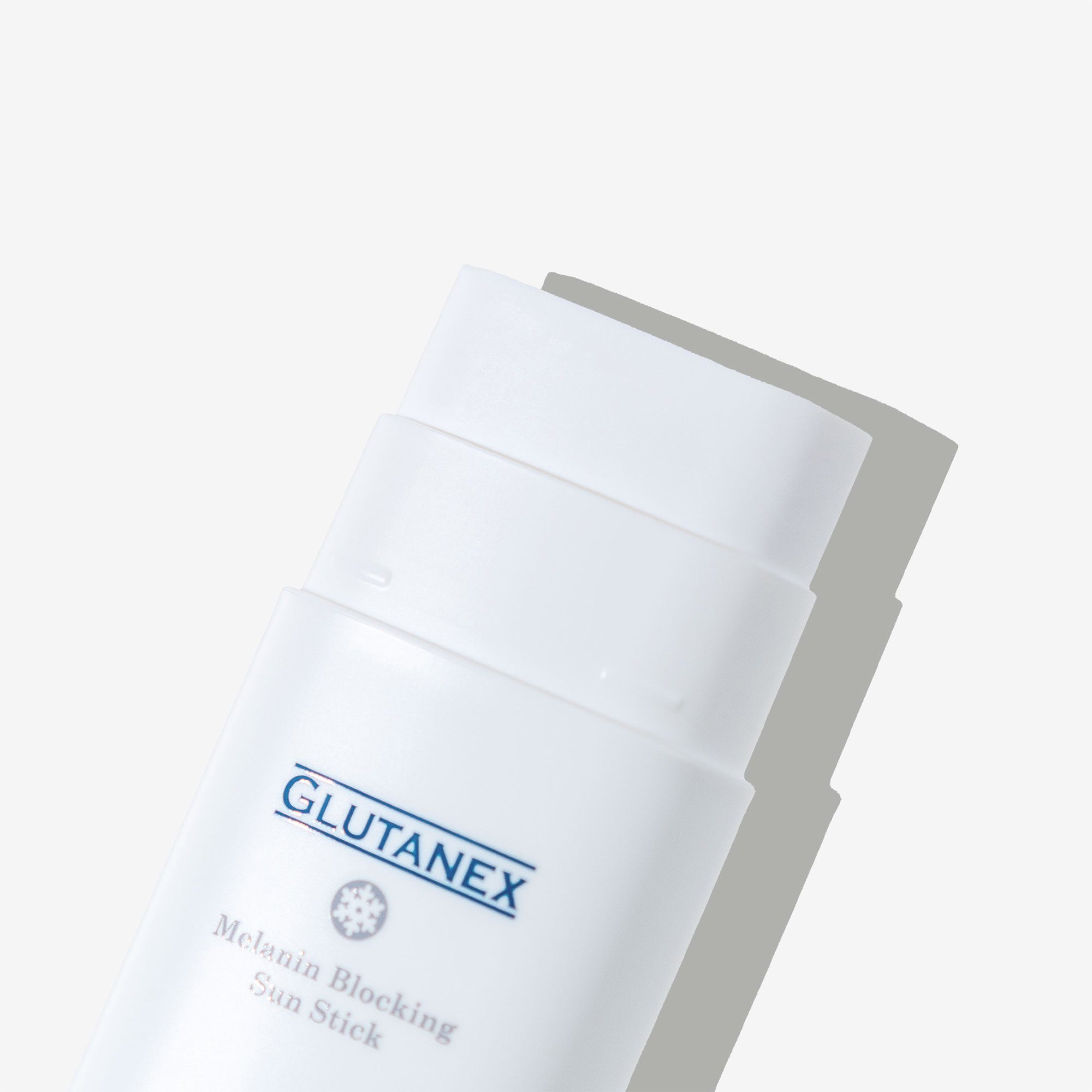 Glutanex Melanin Sun Blocking Stick – a sun protection stick with glutathione for face and body, blocking melanin, safeguarding skin tone, and providing UV defense.